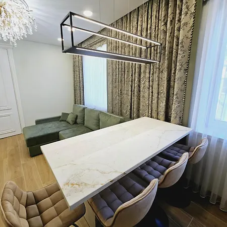 Апартаменти Uzupis Riverside